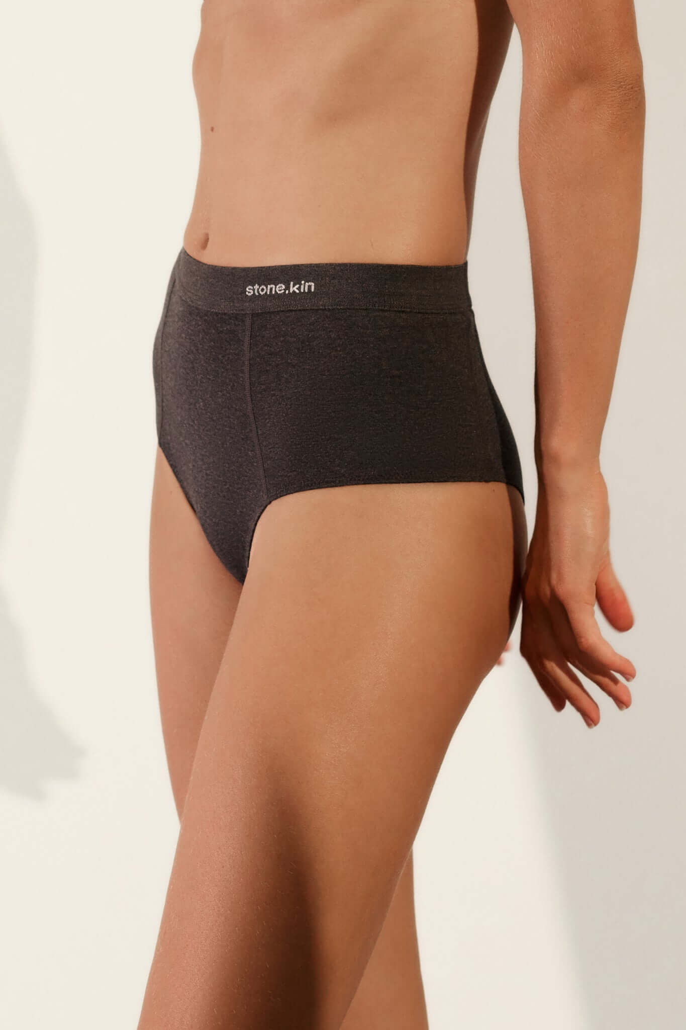 Hi Brief in Organic Cotton Rib - Tar, high-waisted design showcasing soft, breathable fabric against skin.