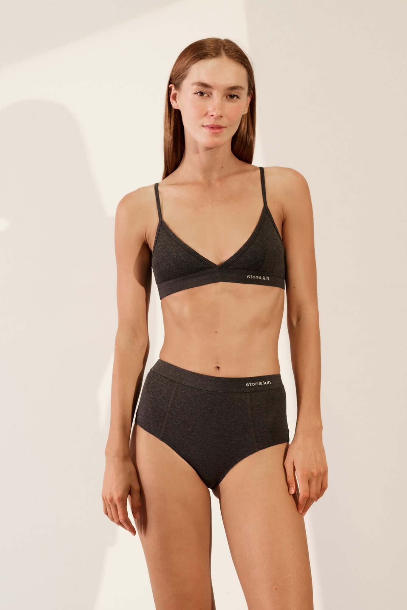 Hi Brief in Organic Cotton Rib - Tar showcased on a model, featuring a high-waisted design in organic cotton.