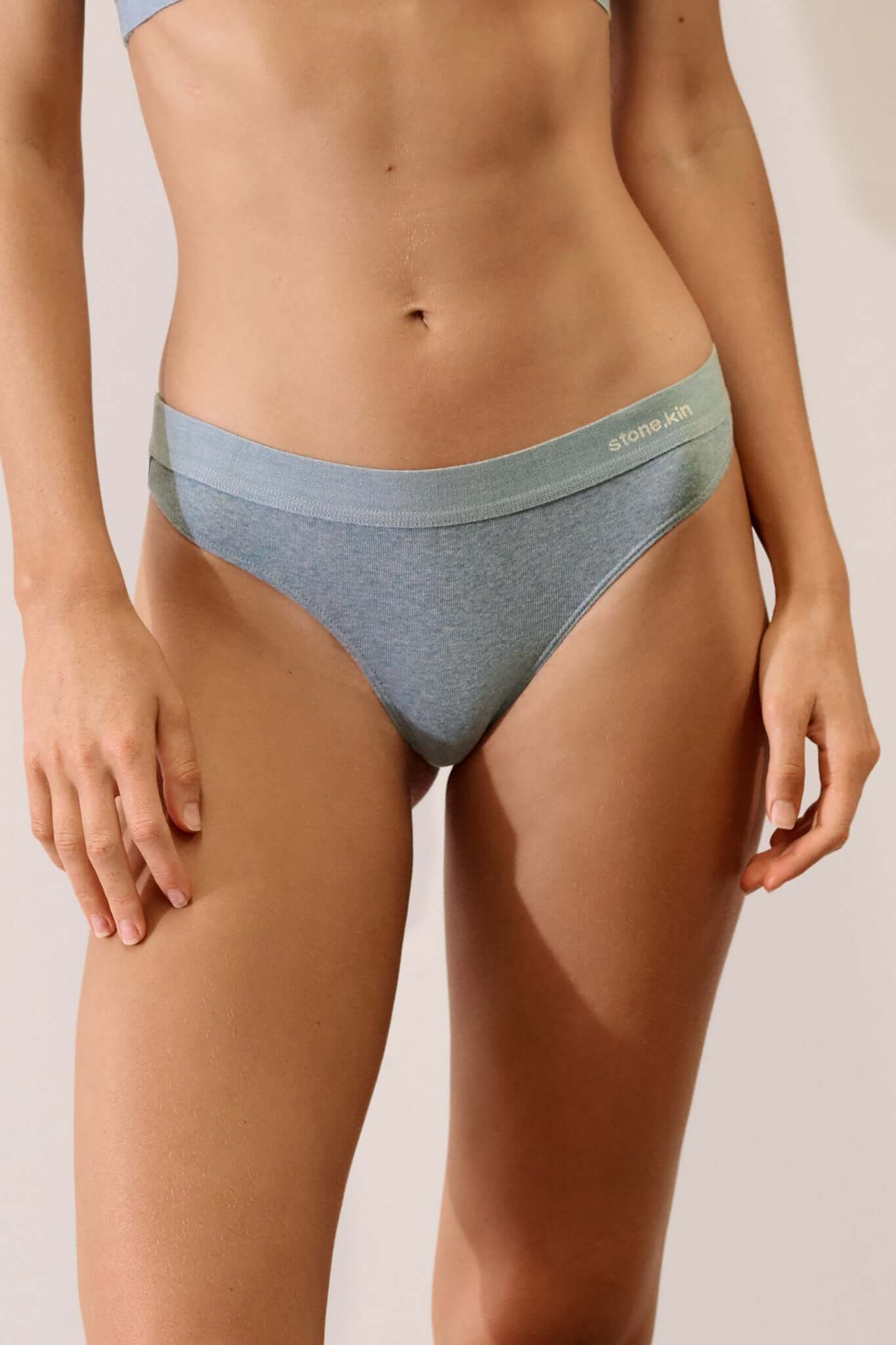 Thong in Organic Cotton Rib - Lake on a model showcasing sporty design and soft organic fabric