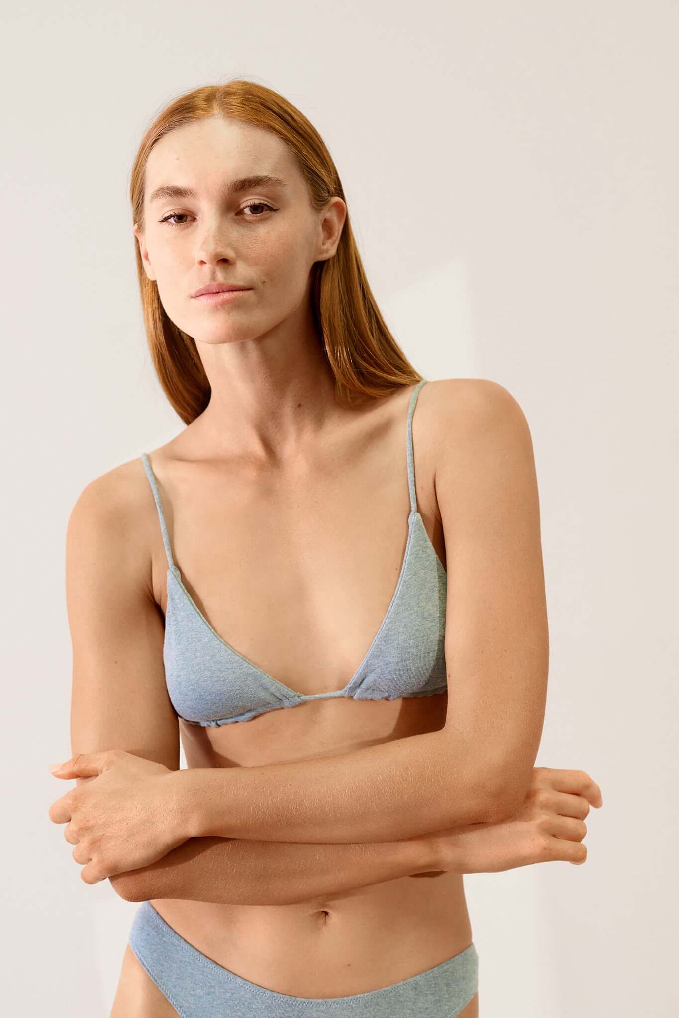 Triangle Bralette in Organic Cotton Rib - Lake worn by a model, showcasing its soft, breathable fabric and slimline cut.