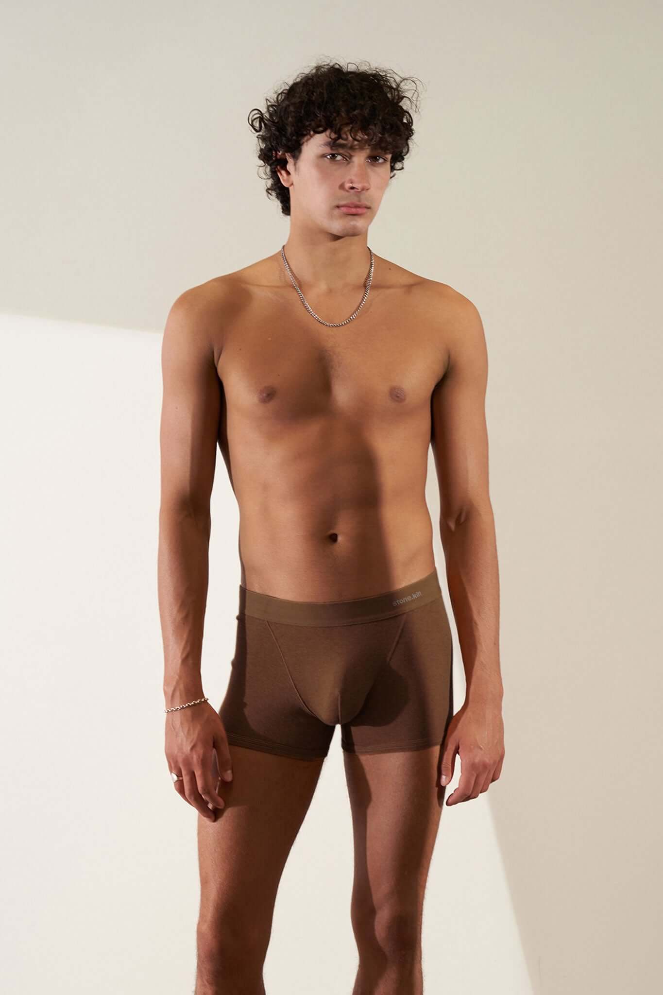 Model wearing Boxer Briefs 3 Pack in Organic Cotton in brown color, showcasing soft and breathable design.