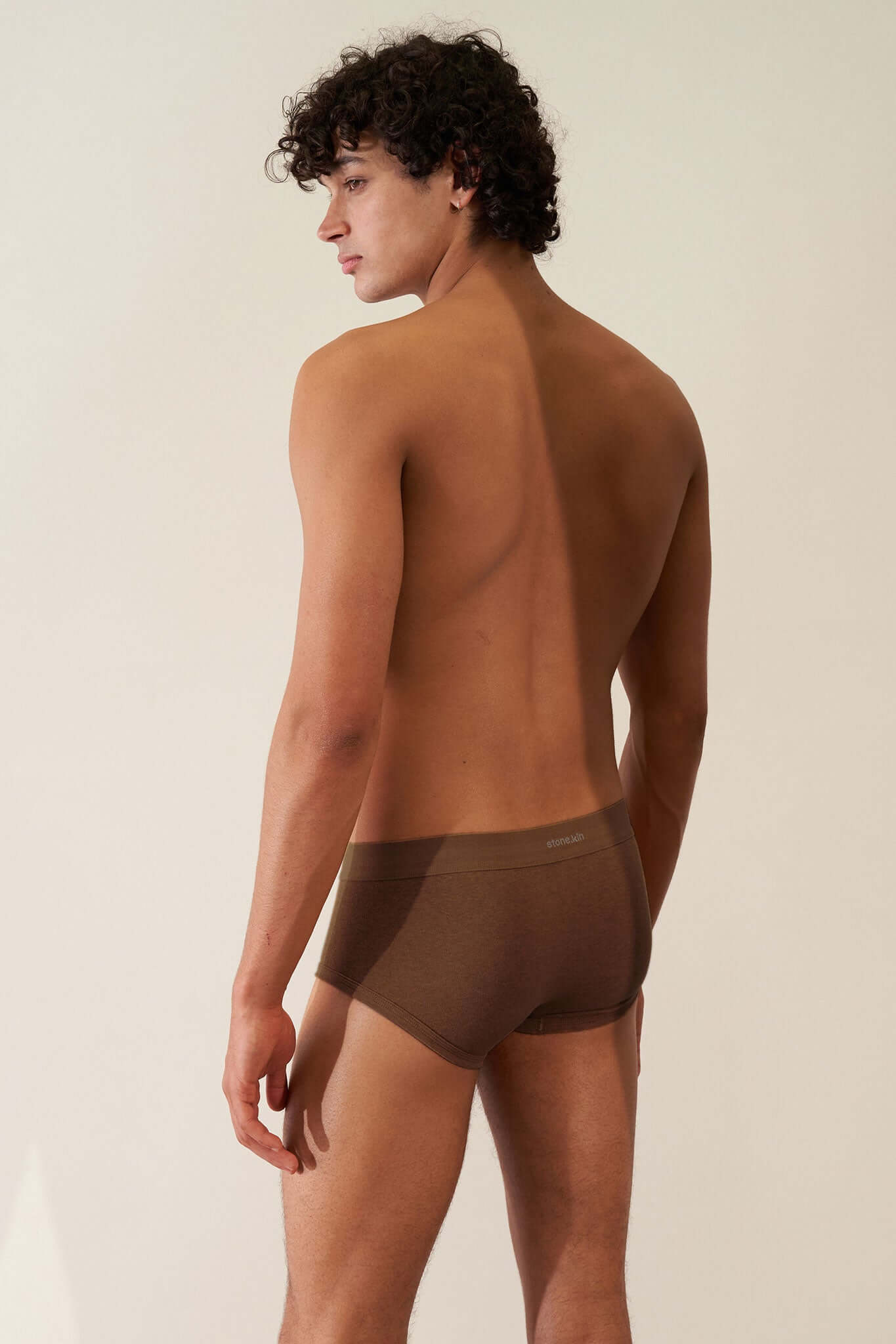 Model wearing the Trunk 3 Pack in Organic Cotton - Brown, showcasing soft organic cotton and comfortable fit.