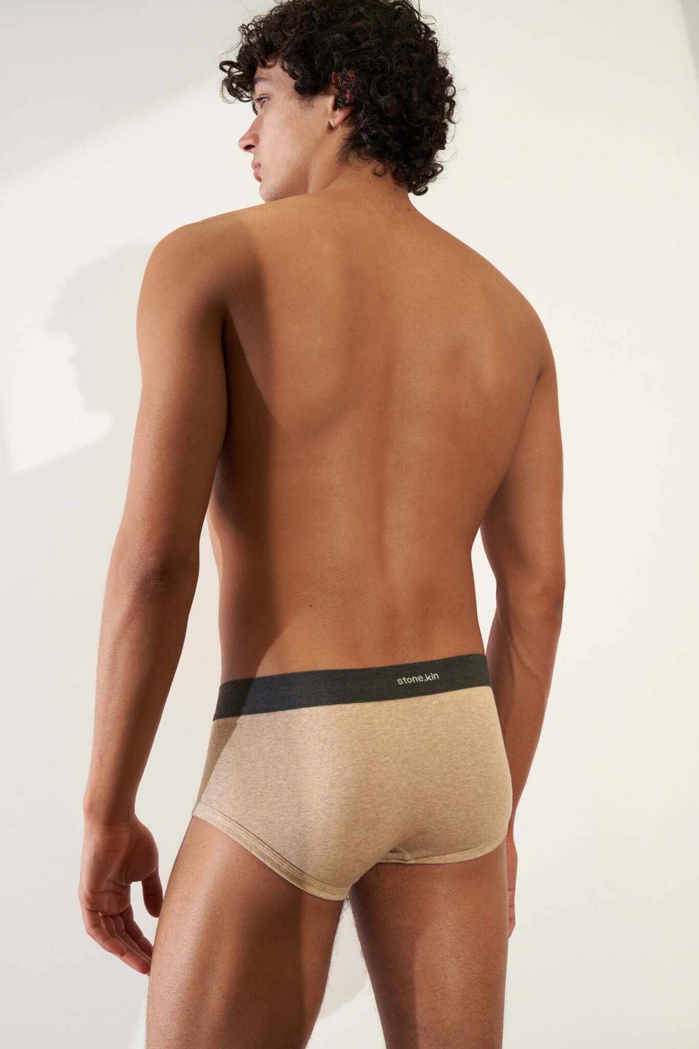 Trunk 3 Pack in Organic Cotton in sand color on model, showcasing modern cut and comfort fit.