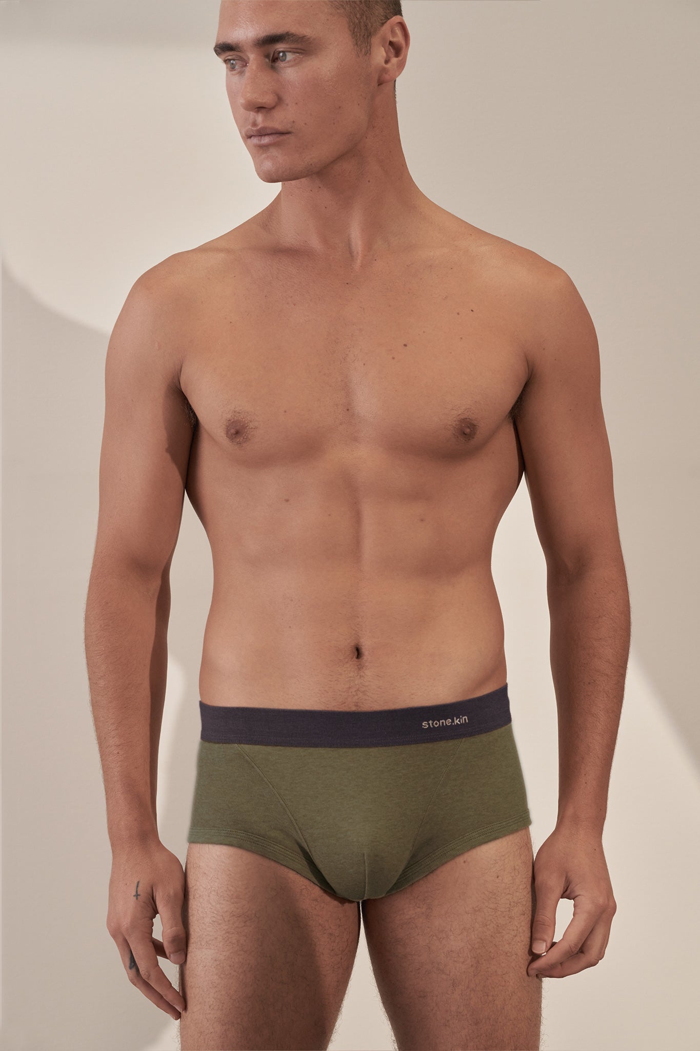Trunk in Organic Cotton Rib - Moss & Tar Stone.kin